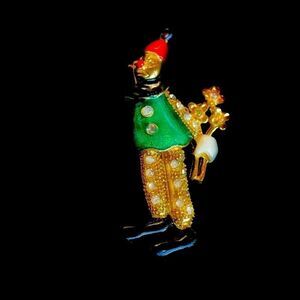 Vintage enamel rhinestone clown with bouquet pin